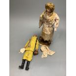 Two costume dolls, one papier mache, the other daisy seller bisque head, both 28cm