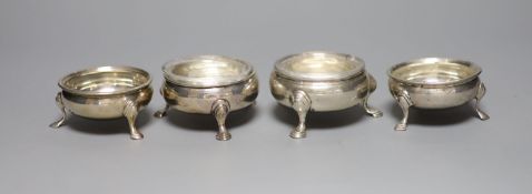 Two George III silver bun salts and a pair of later salts.