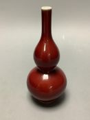 A Chinese copper red glazed double gourd vase, height 17cm