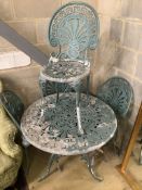 A Victorian style painted aluminium circular garden table with four chairs, table 81cm diameter