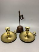 A pair of Regency brass ejector chambersticks (lacking snuffers) and an early 19th century wrought
