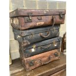 Four vintage leather cases, largest 68cm wide