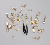 Seven pairs of hallmarked gold earrings, variously set, a single 14K marked stud earring, a pair of