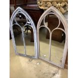 A pair of metal framed lancet arched wall mirrors, width 60cm height 110cm