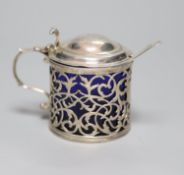 A George III pierced silver drum mustard, London, 1767, (a.f.) with blue glass liner,no maker's
