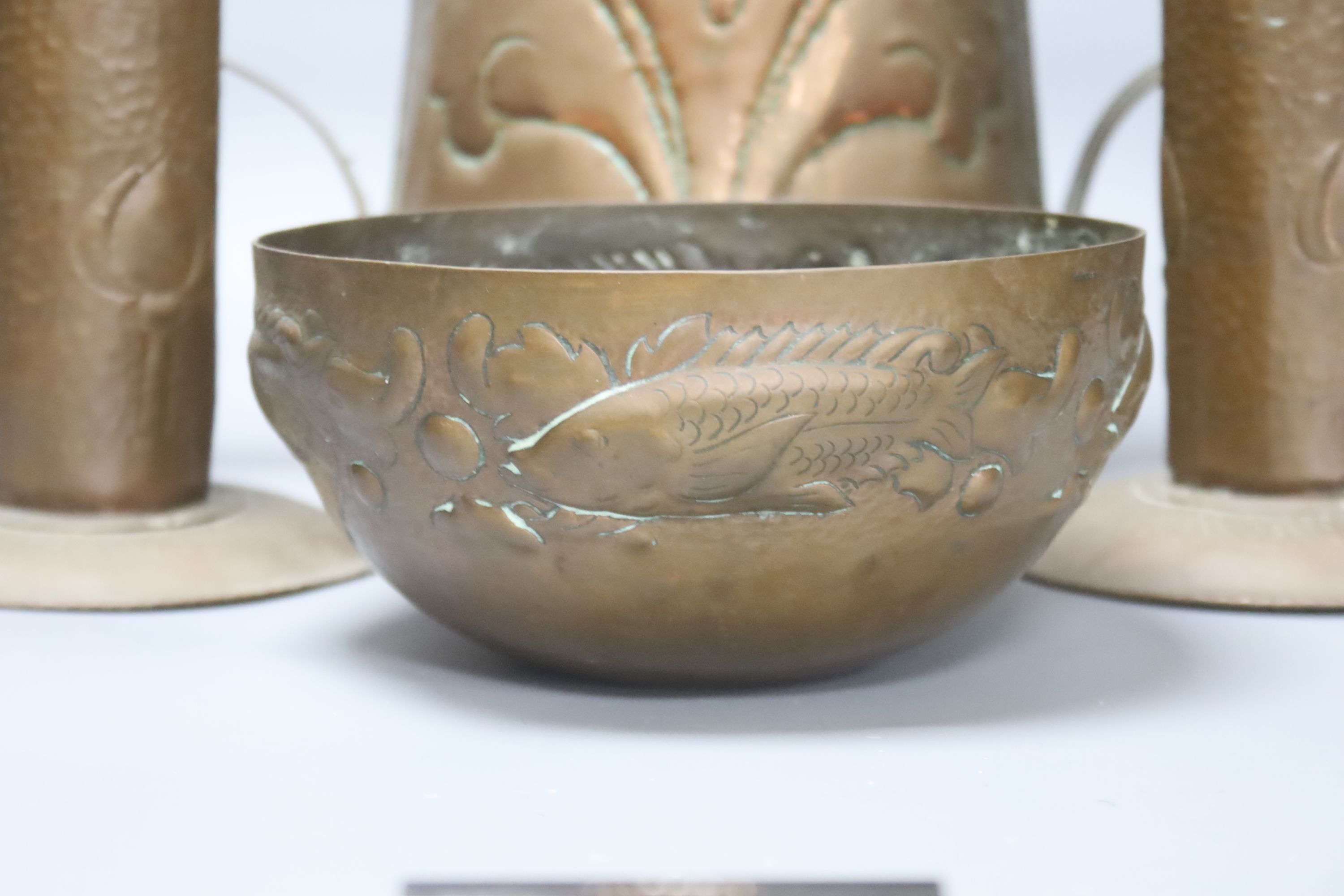 A Newlyn copper 'fish' bowl, together with a pair of Art Nouveau planished copper candlesticks and - Image 2 of 5