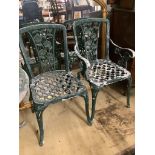 Four cast aluminium chairs, two with arms