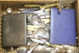 A cased part canteen of silver plated cutlery and a quantity of miscellaneous plated cutlery