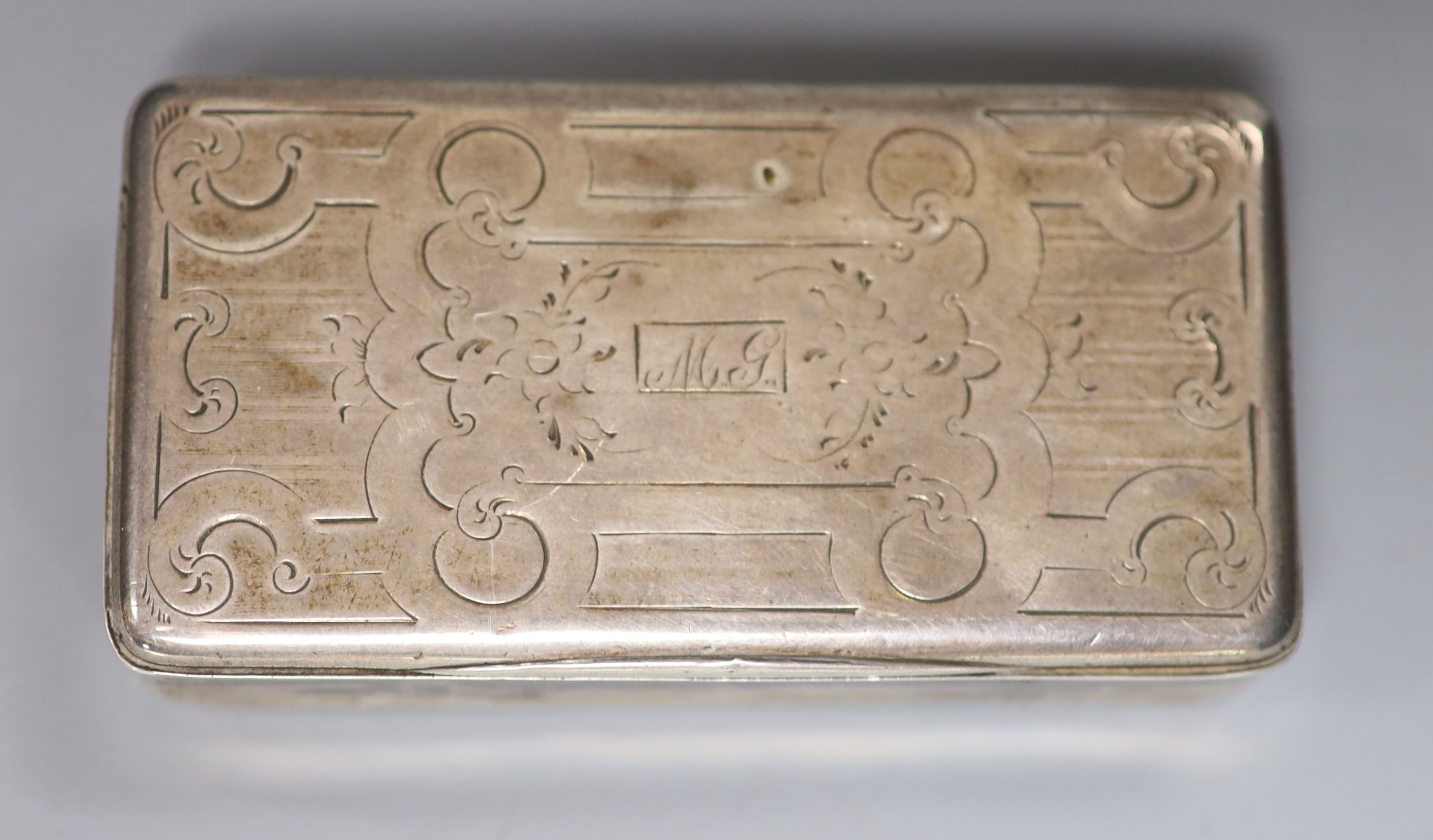 A 19th century continental white metal rectangular snuff box (a.f.),with tired engraved decoration, - Image 2 of 3