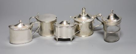 Five mustard pots, various, including a large cylindrical mustard by Mappin & Webb, 1934 Jubilee