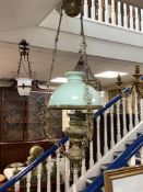 An early 20th century brass hanging oil lamp, drop 85cm