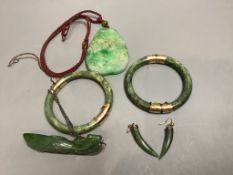 A Chinese jadeite pendant , a pair of bangles, earrings and a cricket pendant