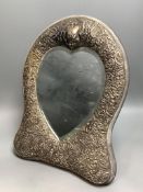 A late Victorian repousse silver mounted easel mirror with heart shaped plate, Henry Matthews,