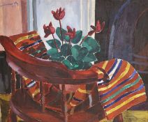 Modern British, oil on canvas, Still life with cyclamen upon an armchair, indistinctly signed and