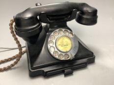 A black bakelite telephone