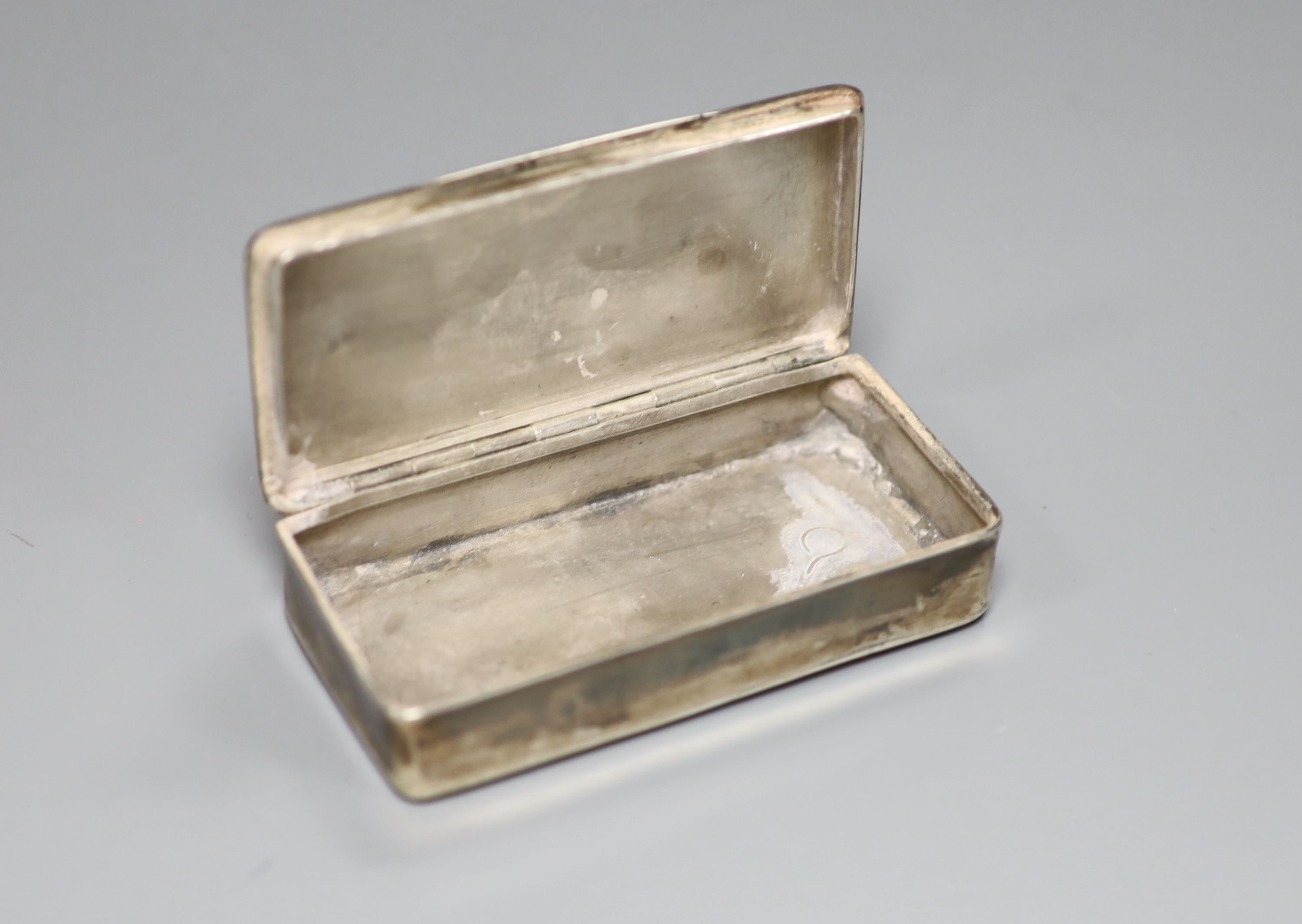 A 19th century continental white metal rectangular snuff box (a.f.),with tired engraved decoration, - Image 3 of 3