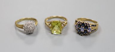 A diamond and 9ct gold cluster ring and two other 9k rings,gross 11.5 grams.