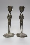 A pair of bronze figural candlesticks, height 24cm