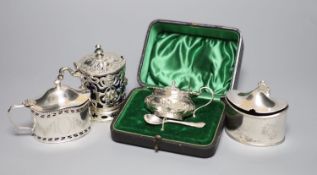 Four mustard pots, various, including a George III oval silver mustard, London 1789, Henry Chawner,