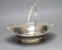 A George III pierced silver oval cake basket, maker's mark rubbed, London, 1786,with engraved