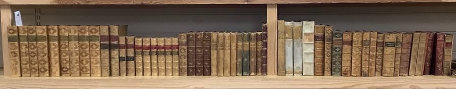 ° A collection of mixed 19th and 20th century leather bound books