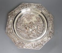 An early 20th century Elkington type silver plated tazza embossed with hunting dogs, 29cm