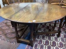 A late 17th century oak oval topped gateleg table