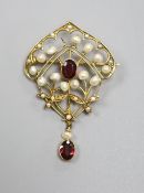 An early 20th century yellow metal, garnet and seed pearl set drop brooch( pearl missing), 47mm,