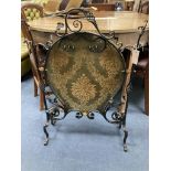 An Arts and Crafts wrought iron fire screen, width 60cm, height 83cm