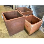 Three square terracotta planters, largest 36cm wide, height 40cm