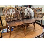 A set of six Ercol elm and beech Windsor dining chairs