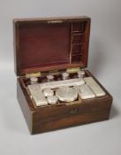 An early Victorian W.Lund brass bound rosewood toilet box with silver mounted fittingsTop tray with