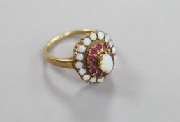 A 1960's 9ct gold, ruby and white opal set cluster ring (ruby missing),size P, gross 4.1 grams.