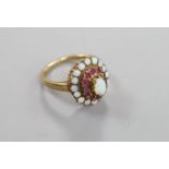 A 1960's 9ct gold, ruby and white opal set cluster ring (ruby missing),size P, gross 4.1 grams.