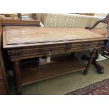 A 19th century French oak two-tier side table, length 130cm, depth 55cm, height 73cm