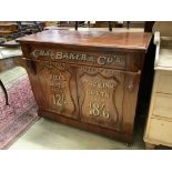 A tailor's bespoke carved mahogany shop cabinet, fitted two panelled doors, inscribed to the front