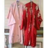 A pink silk Japanese kimono embroidered with wisteria and irises and butterflies, length 140cm,