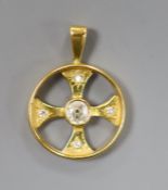 A 22ct gold and diamond set circular pendant (converted wedding band), overall 25mm, gross weight