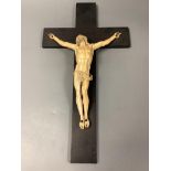 A 19th century Dieppe carved ivory and ebony crucifix, overall length 48cm