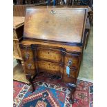 A small Queen Anne revival walnut bureau with slide, width 52cm, depth 40cm, height 96cm