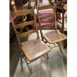 A set of eight early 20th century beech folding garden chairs