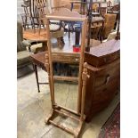 A reproduction pine cheval mirror, height 147cm