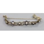 A continental gilt white metal, sapphire and split pearl flower head cluster set bracelet,approx.