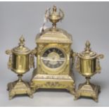 A French brass ornate clock garniture, with French movement, clock height 41cm