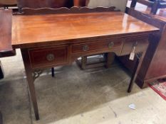 A George III style kneehole dressing table, width 114cm, depth 57cm, height 82cm