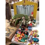 A collection of antique toys, to include a collection of puppets and a toy proscenium theatre