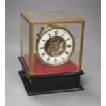 A Eureka Clock Co. Ltd electric clock in four glass case