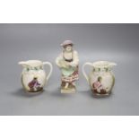 A 19th century Berlin figure, 14cm high and two small jugs