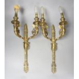 A pair of two branch ormolu wall lights with cherubs, height 42cm