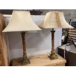 A pair of 'David Hunt' wood and gilt metal table lamps, height 63cm
